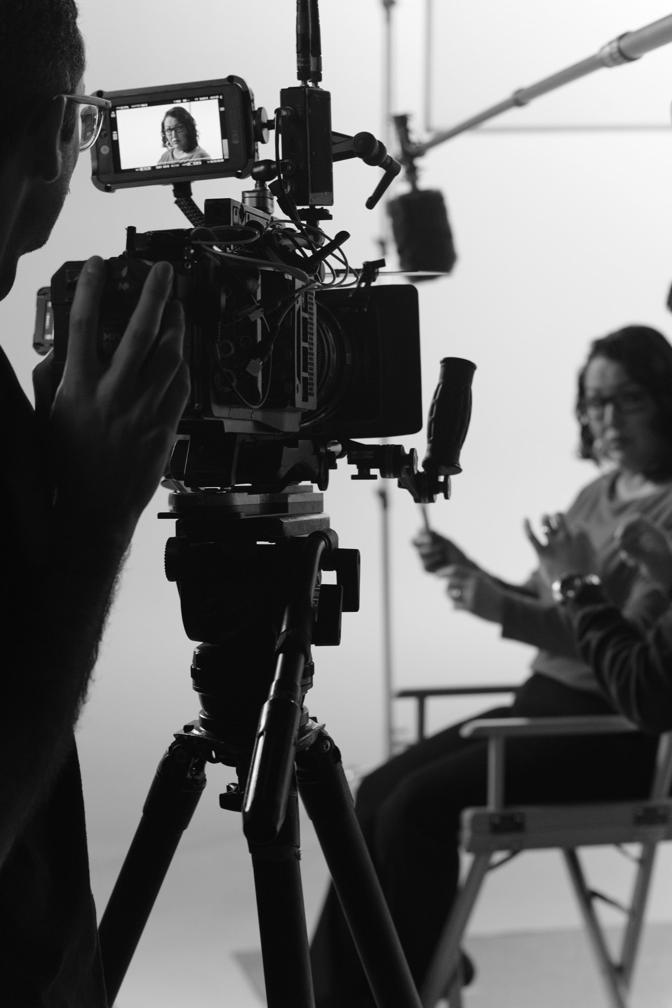 Alex, Blue Barn videographer, filming on the Goodfeet commercial set