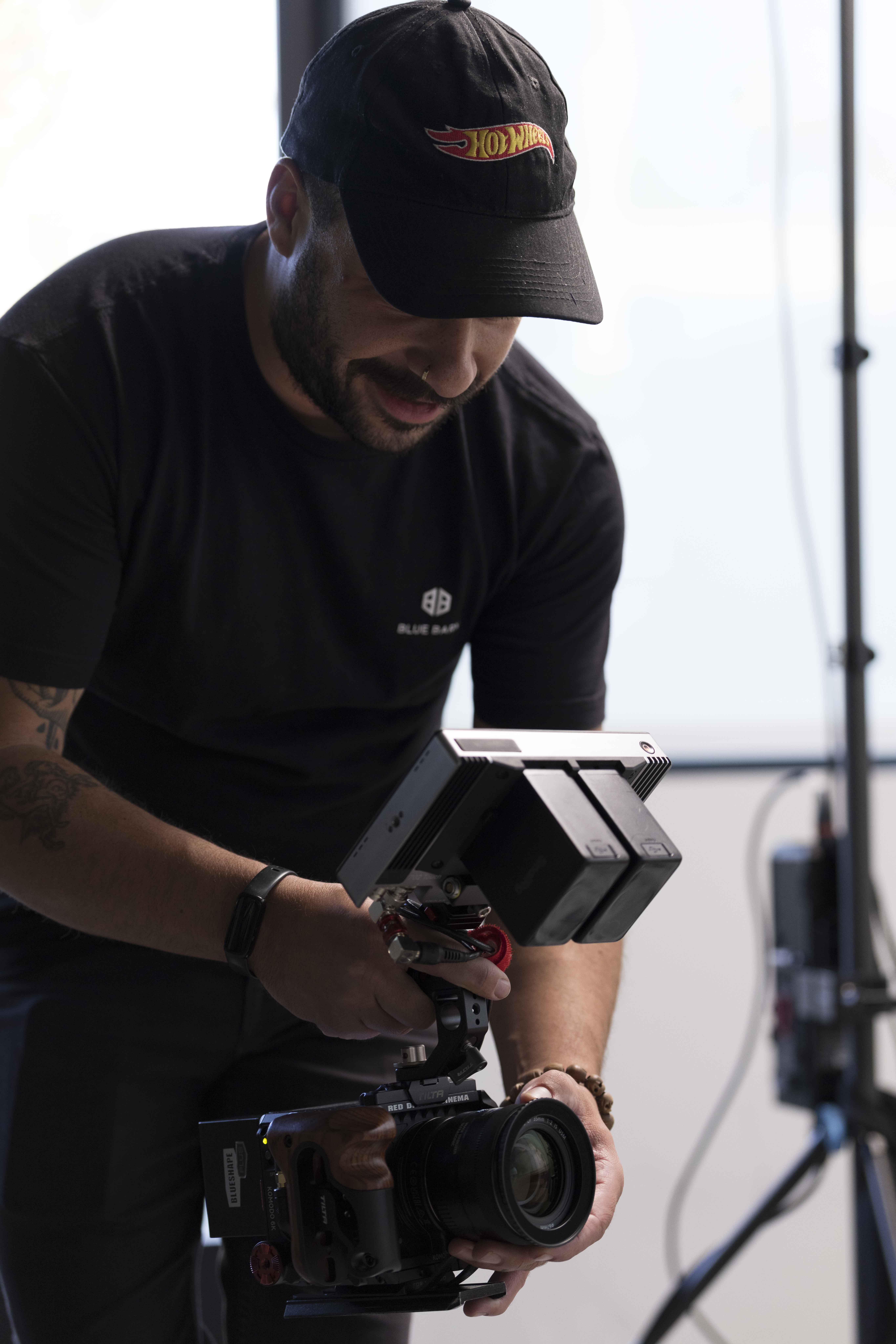 Josh, Blue Barn videographer, filming on set