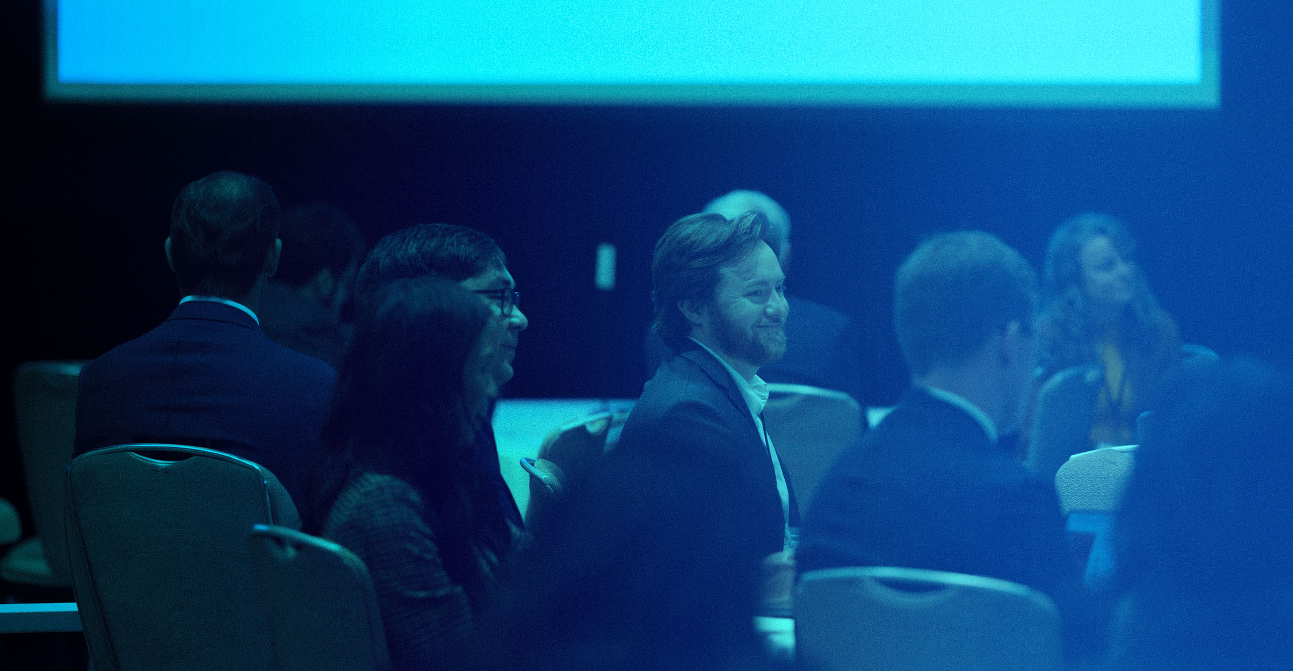Engaged audience at a corporate conference filmed by Blue Barn Creative