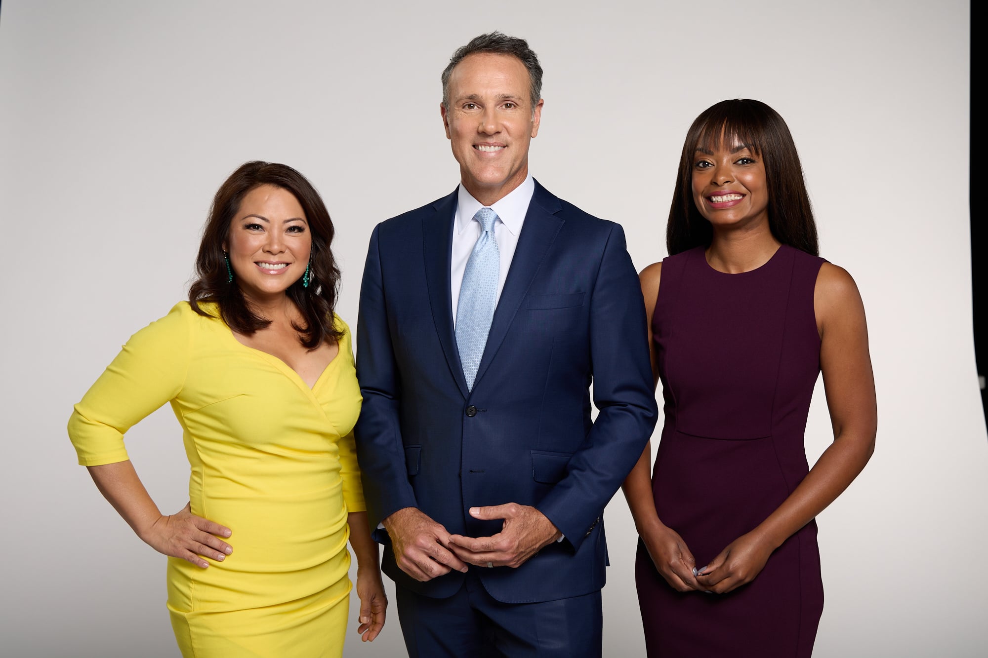 Group portrait — CBS8 anchors Marcella, Carlo, and Karlene
