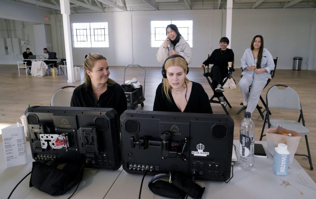 Blair and the Summer Fridays team watching the filming on set in LA