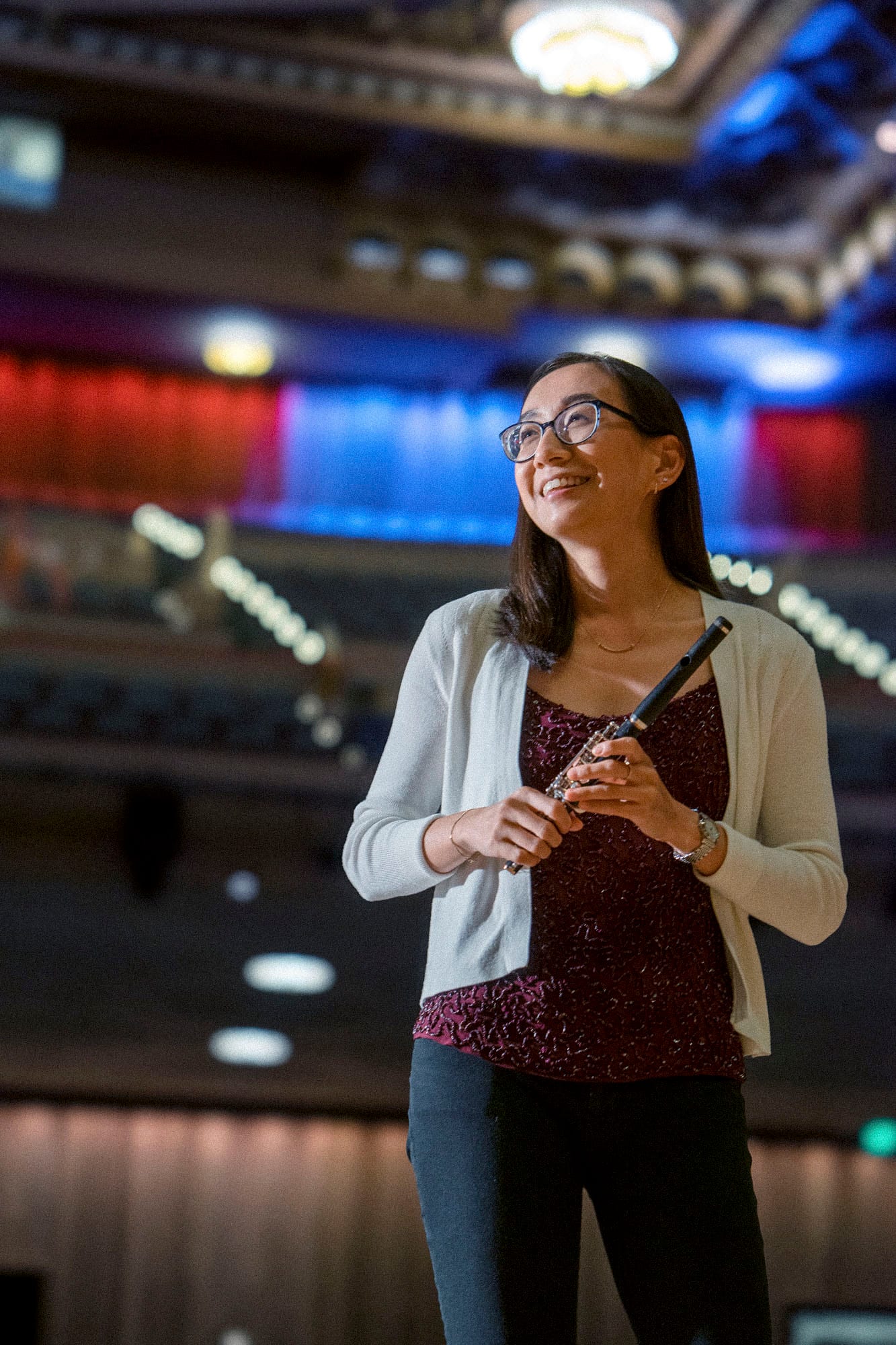 A San Diego Symphony piccolo player on stage at the Jacobs Music Center